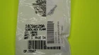 Shipping label with a barcode and tracking numbers on a parcel against a bright green background