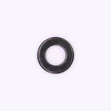 Small metal washer on a white background, circular with a central hole.