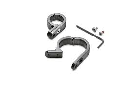 Two metal U-shaped lock shackles with a lock body, plus keys and small hardware, shown disassembled.