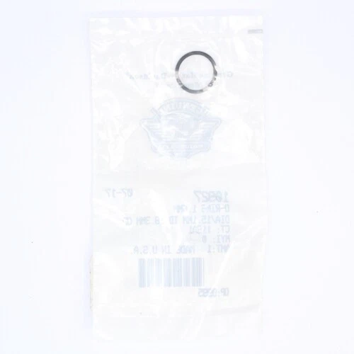 10927 | Harley-davidson® Online Translucent plastic bag with a small circular metal ring attached at the top, a faded emblem and barcode visible through the bag.