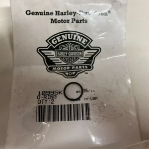 Harley-Davidson Genuine Motor Parts package with a small circular ring and barcode label on a white background