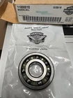 New ball bearing sealed in a clear plastic bag, with a cardboard box visible in the background.