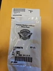 Transparent plastic bag on a yellow background with a labeled barcode and a logo visible on the front.