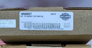 16500227 | Harley-davidson® Online Brown cardboard box featuring a white shipping label with a barcode and the code 16500227.