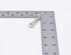 L-shaped metal ruler with centimeter scales forming a right angle on a light background