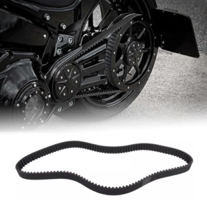 Close-up of a motorcycle’s chain drive with a toothed rubber drive belt laid on the ground.