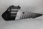Metal wing-shaped component with a pointed tip and ribbed, tapered body, mounted on a dark base.