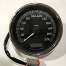 Round analog speedometer gauge (0–200 mph) with chrome bezel, needle near 0, plus wiring harness visible below.
