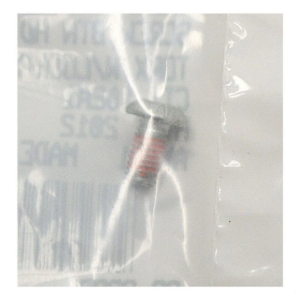 Close-up of a white cord tangled around a gray plastic fastener with a red striped band in the center.