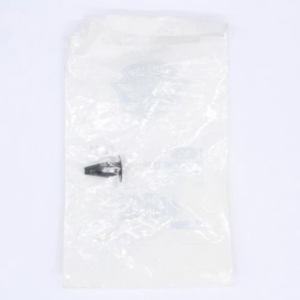 Small metal screw inside a transparent plastic bag on a white background.