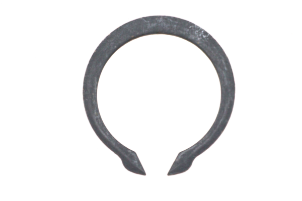 Close-up of a dark metal circular ring with a small open gap at the bottom.