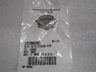 Small sealed plastic bag containing a metal hardware piece and a barcode label on it.