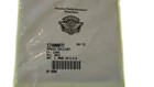 Small white plastic bag with a black logo, barcode, and text label on the front, inside a neon yellow outer bag.