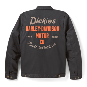 Back of a dark gray jacket showing Harley‑Davidson and Dickies branding in orange/beige, with 'Built to Outlast' script on the back.