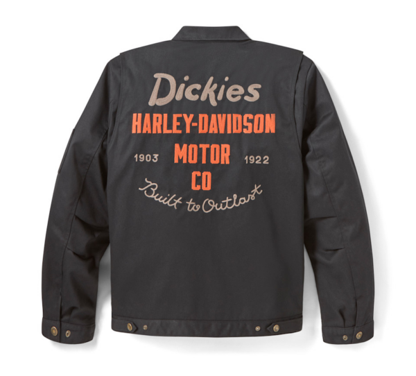 Back of a dark gray jacket showing Harley‑Davidson and Dickies branding in orange/beige, with 'Built to Outlast' script on the back.