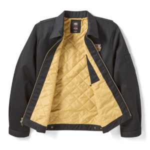 Black bomber jacket opened to reveal tan quilted lining and an interior zip pocket on the left side.