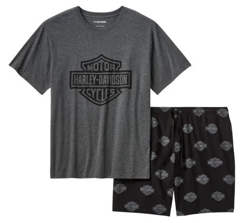 Gray Harley-Davidson T-shirt with a large front logo, paired with black shorts that have a repeating Harley-Davidson logo pattern.