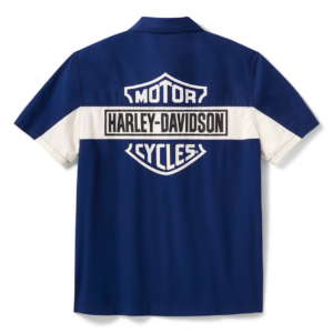 Back view of a blue Harley‑Davidson shirt with a white horizontal stripe and bold Harley‑Davidson/MOTOR CYCLES logos across the back.