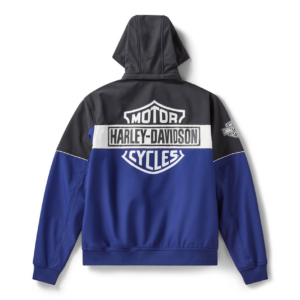 Back view of a blue and black Harley-Davidson motorcycle jacket with a large Motor Harley‑Davidson Cycles logo across the upper back and a white stripe; small emblem on the right sleeve shows the Harley logo.