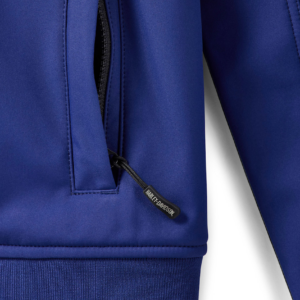 Close-up of a blue jacket zipper with a black pull tab that reads 'Harley-Davidson'.