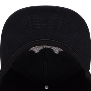 Inside view of a black baseball cap, curved brim and visible white logo on the inner front panel.