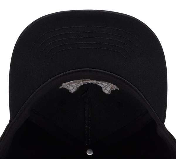 Inside view of a black baseball cap, curved brim and visible white logo on the inner front panel.