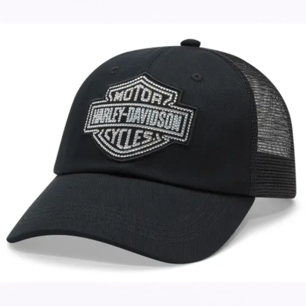 Black trucker cap with a padded front panel and a Harley‑Davidson shield logo on the crown, curved brim and mesh back.