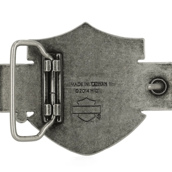 Back view of a gray metal belt buckle with its locking prong and hinge mechanism; stamped 'Made in Taiwan' on the plate.