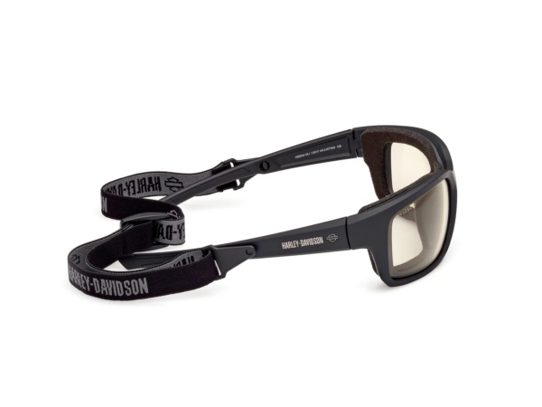 Black Harley-Davidson protective goggles with foam padding and an adjustable strap on a white background.
