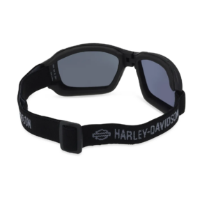 Black motorcycle goggles with gray-blue lenses and a padded frame, featuring an adjustable strap that reads HARLEY-DAVIDSON