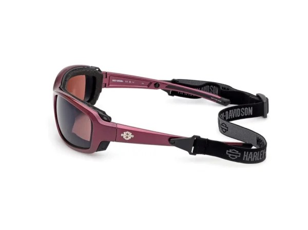 Pink Harley‑Davidson sport sunglasses with dark lenses and an adjustable black strap branded Harley‑Davidson on the side.