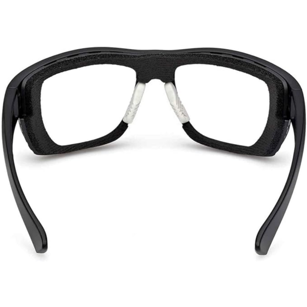 Black pair of eyeglasses or smart glasses with foam nose pads, viewed from the front, showing a wraparound frame.