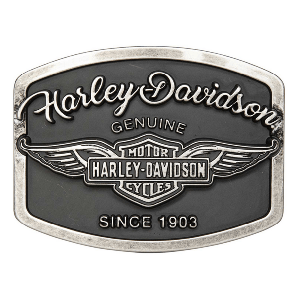 Harley-Davidson belt buckle with winged emblem and 'Since 1903' inscription on a dark background.